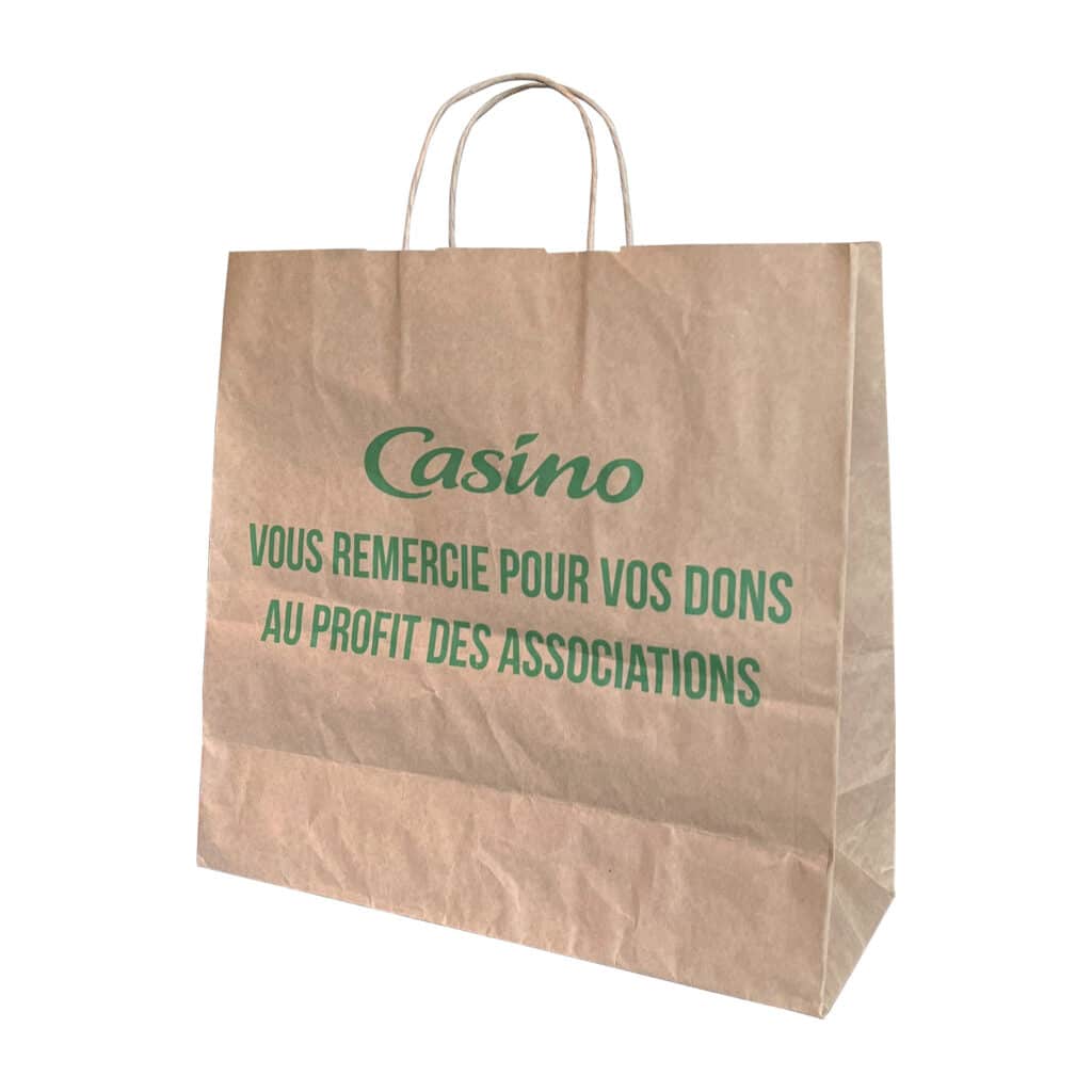 Sac en papier kraft naturel brun, avec une impression monochrome verte avec le message "Casino vous remercie pour vos dons au profit des associations". Ce sac est développé à l'occasion de la Grande Collecte Alimentaire des Banques Alimentaires